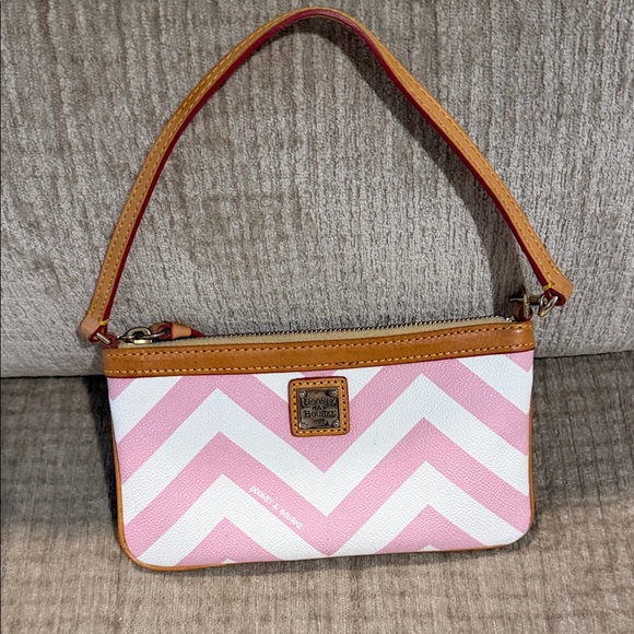 Dooney & Bourke Chevron large slim  Pink and White Zigzag Wristlet 7 by 4 1/2”